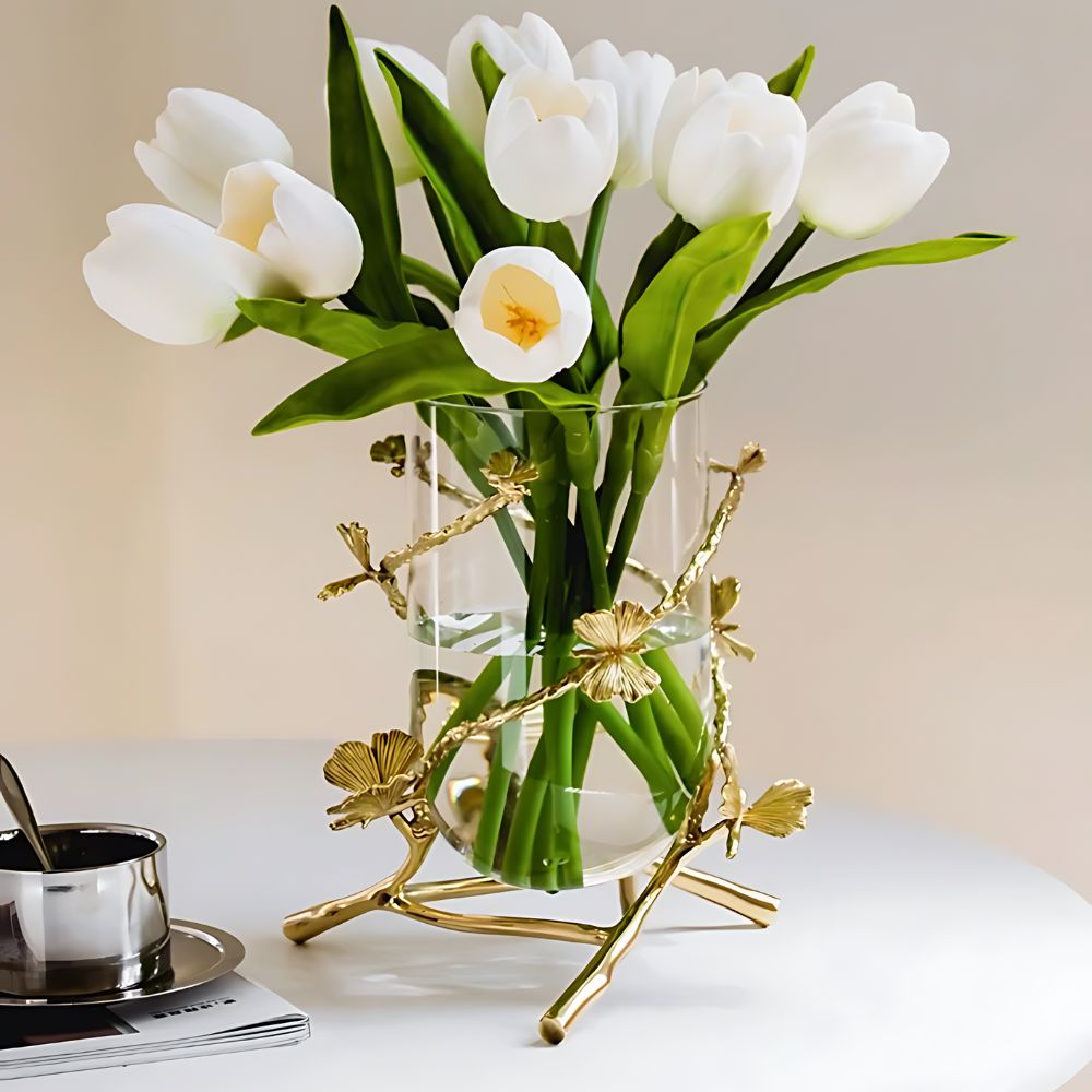 Clear glass vase wrapped gold butterflies white flowers