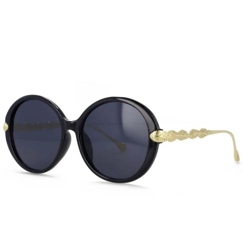 circular black sunglasses gold temple