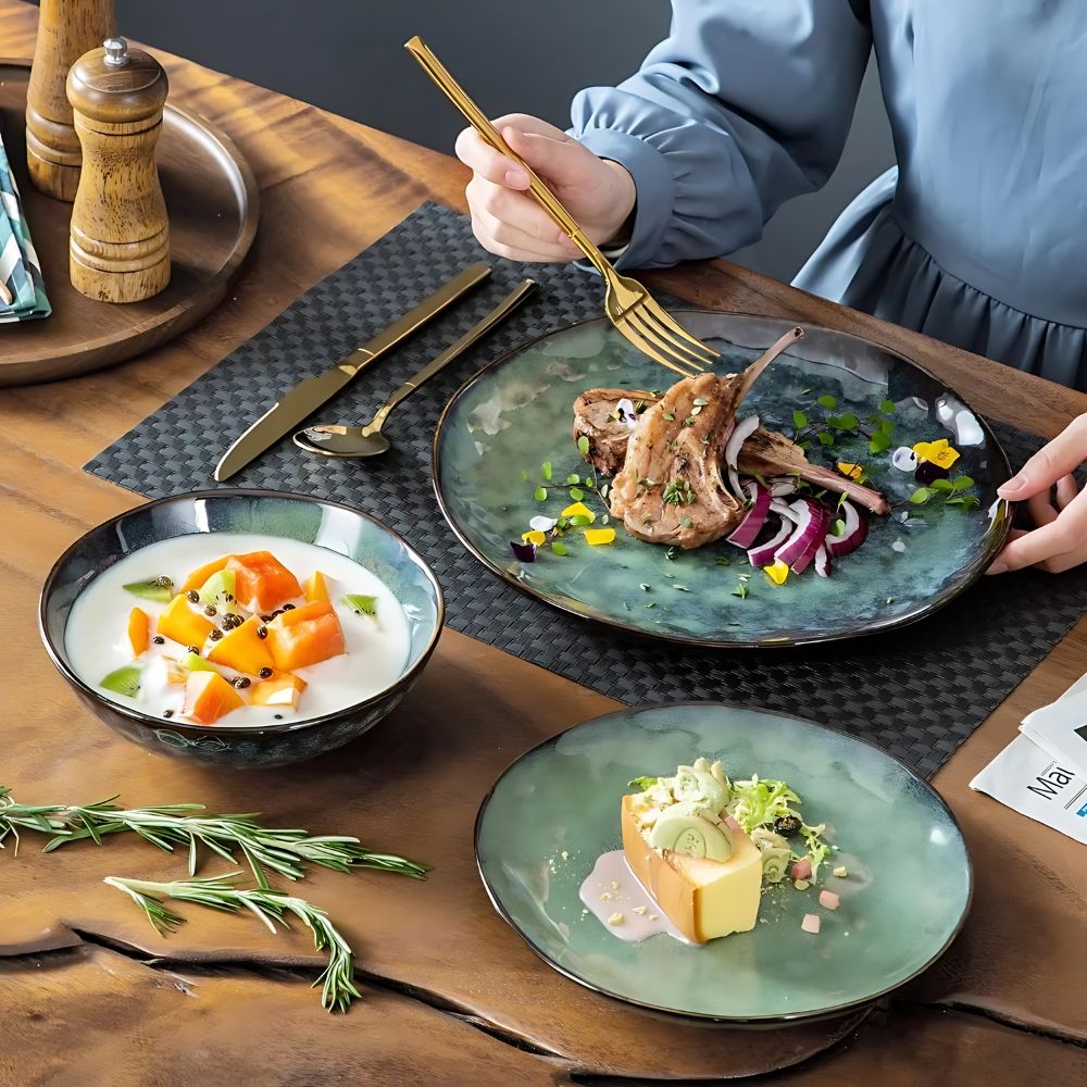 Blue green artisan dinnerware set at dinner